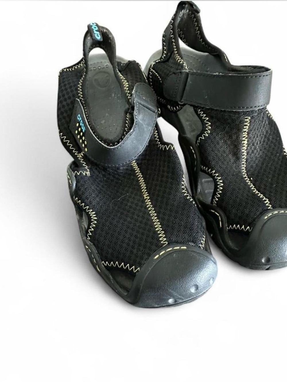 Crocs men’s swiftwater Meshu Deck sandals in black with distinctive yellow